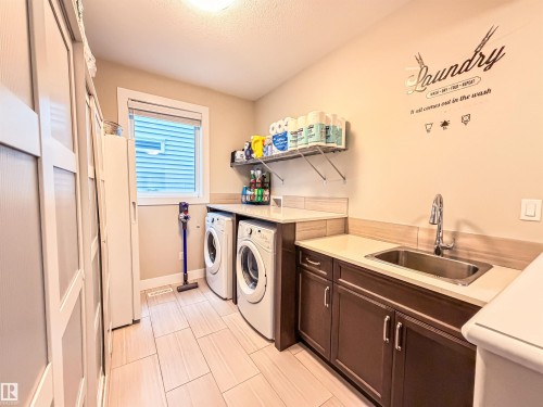 9004 24 Avenue, Edmonton, AB - Indoor Photo Showing Laundry Room