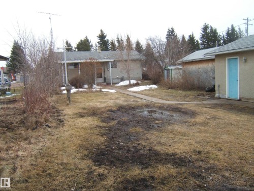Single-story residence with a covered front porch and an asphalt shingle roof - 5030 52 Avenue, Andrew, AB - Outdoor