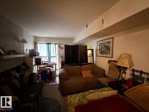 105 10604 110 Avenue, Edmonton, AB - Indoor Photo Showing Living Room