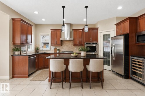 Virtually Staged - 976 Hollingsworth Bend, Edmonton, AB - Indoor Photo Showing Kitchen With Stainless Steel Kitchen With Upgraded Kitchen