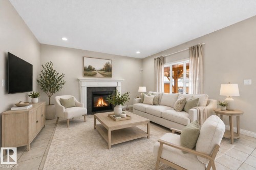 Virtually Staged - 976 Hollingsworth Bend, Edmonton, AB - Indoor Photo Showing Living Room With Fireplace