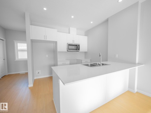 7230 Rosenthal Drive, Edmonton, AB - Indoor Photo Showing Kitchen With Double Sink
