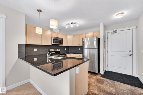 310 3719 Whitelaw Lane, Edmonton, AB - Indoor Photo Showing Kitchen With Stainless Steel Kitchen With Double Sink