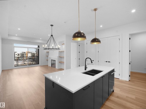 402 7459 May Common, Edmonton, AB - Indoor Photo Showing Kitchen With Double Sink With Upgraded Kitchen