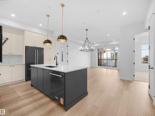 402 7459 May Common, Edmonton, AB - Indoor Photo Showing Kitchen With Upgraded Kitchen