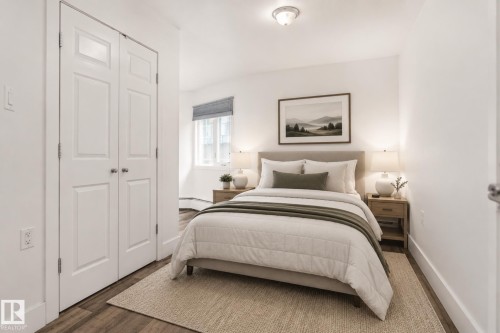 Second Bedroom with ensuite - virtually staged - 103 9715 110 Street, Edmonton, AB - Indoor Photo Showing Bedroom