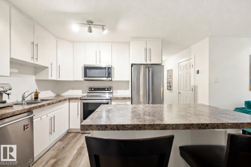 103 9715 110 Street, Edmonton, AB - Indoor Photo Showing Kitchen With Double Sink With Upgraded Kitchen