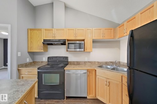 421-3425 19 Street, Edmonton, AB - Indoor Photo Showing Kitchen With Double Sink