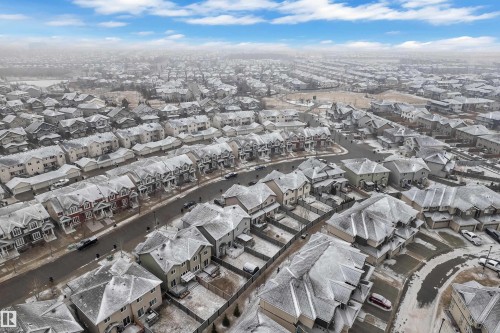 Aerial perspective showcasing a residential development with varied architectural styles - 718 177 Street, Edmonton, AB - Outdoor With View