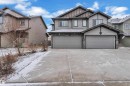 Contemporary multi-level exterior with siding and stone accents - 718 177 Street, Edmonton, AB  - Outdoor 