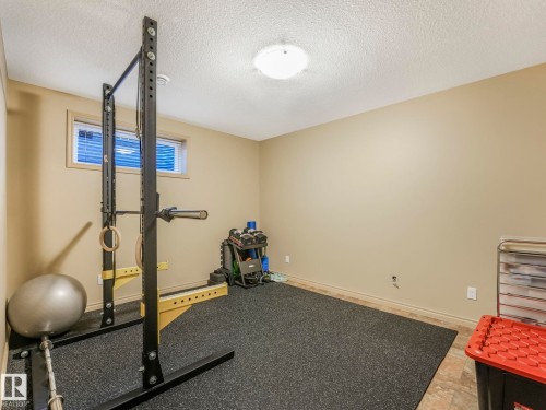 Bedroom #2 - 8723 207 Street Nw, Edmonton, AB - Indoor Photo Showing Gym Room
