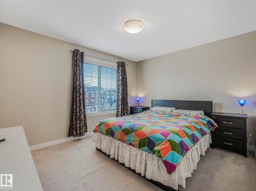 Neutral wall paint in a matte finish - 96 8315 180 Avenue, Edmonton, AB - Indoor Photo Showing Bedroom