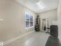 Neutral tone walls complementing light-colored floor tiles - 96 8315 180 Avenue, Edmonton, AB  - Indoor 