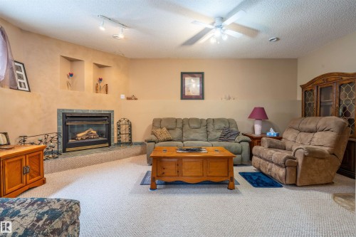 6111 53 Avenue, Cold Lake, AB - Indoor Photo Showing Living Room With Fireplace