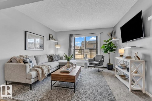 113 5951 165 Avenue, Edmonton, AB - Indoor Photo Showing Living Room