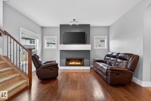 11732 18 Avenue, Edmonton, AB - Indoor Photo Showing Living Room With Fireplace