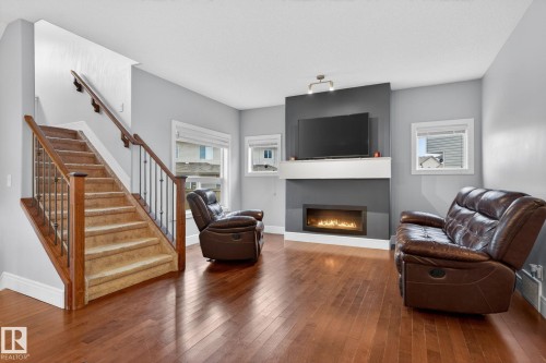 11732 18 Avenue, Edmonton, AB - Indoor Photo Showing Living Room With Fireplace
