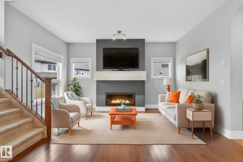 11732 18 Avenue, Edmonton, AB - Indoor Photo Showing Living Room With Fireplace