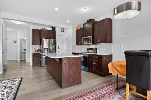 5242 23 Avenue, Edmonton, AB - Indoor Photo Showing Kitchen With Stainless Steel Kitchen With Upgraded Kitchen