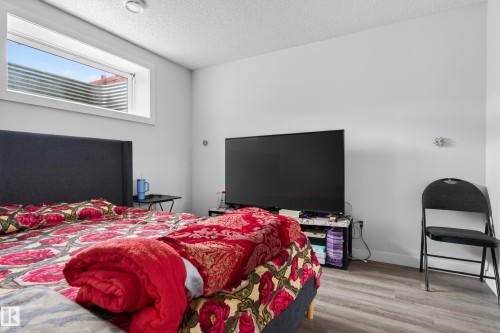 5242 23 Avenue, Edmonton, AB - Indoor Photo Showing Bedroom
