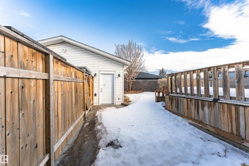 Detached garage with white siding and a gabled roofline - 3208 130 Avenue, Edmonton, AB - Outdoor