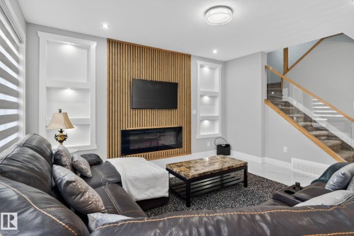 1815 17 Avenue, Edmonton, AB - Indoor Photo Showing Living Room With Fireplace