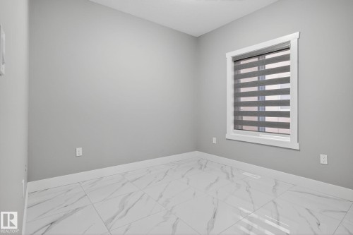 1815 17 Avenue, Edmonton, AB - Indoor Photo Showing Other Room