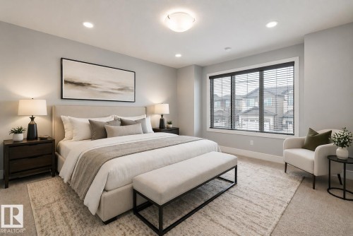 Spacious bedroom featuring light gray walls, recessed lighting, and a large window with horizontal blinds - 4235 Chichak Close, Edmonton, AB - Indoor Photo Showing Bedroom