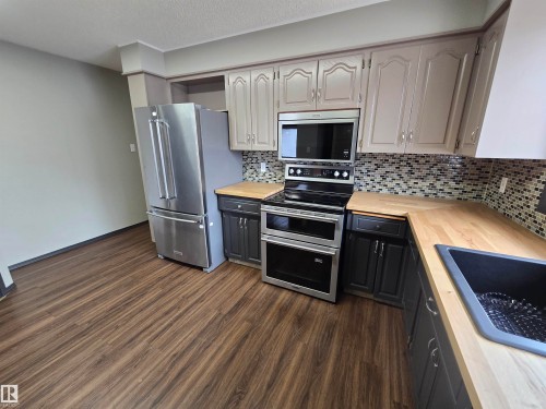 4101 South Park Drive, Leduc, AB - Indoor Photo Showing Kitchen With Stainless Steel Kitchen With Double Sink