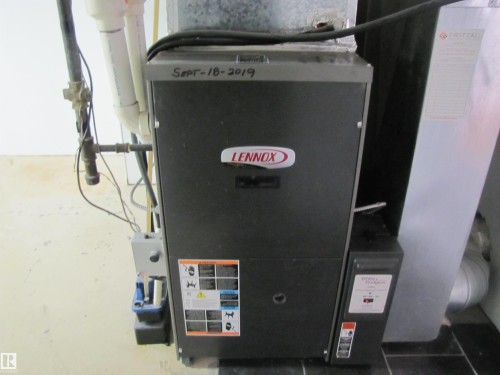 Lennox furnace unit featuring a connected Wirsbo manifold system - 7135 87 Street, Edmonton, AB - Indoor Photo Showing Basement