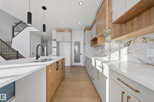 461 Crystal Creek Link, Leduc, AB - Indoor Photo Showing Kitchen With Double Sink With Upgraded Kitchen
