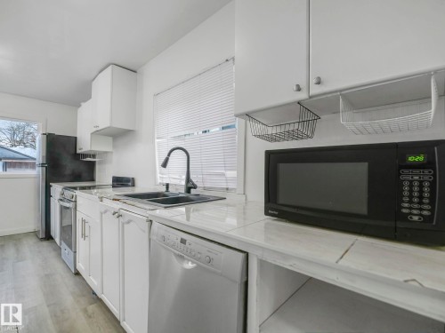 9632 106A Avenue, Edmonton, AB - Indoor Photo Showing Kitchen With Double Sink