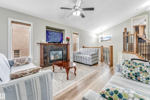 3228 18 St, Edmonton, AB - Indoor Photo Showing Living Room With Fireplace
