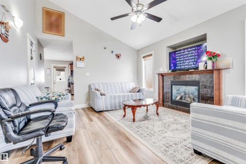 3228 18 St, Edmonton, AB - Indoor Photo Showing Living Room With Fireplace
