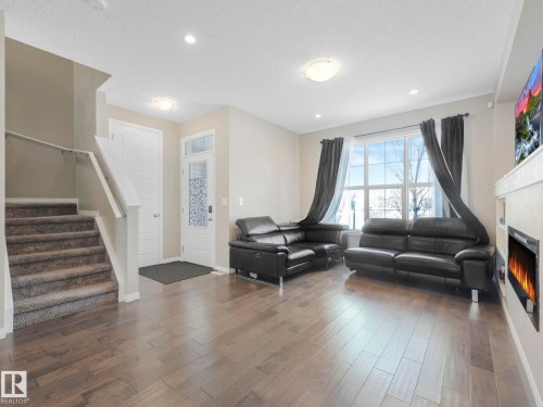 8119 Chappelle Way, Edmonton, AB - Indoor Photo Showing Living Room With Fireplace