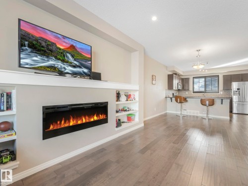 8119 Chappelle Way, Edmonton, AB - Indoor Photo Showing Living Room With Fireplace