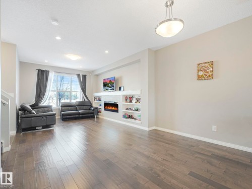 8119 Chappelle Way, Edmonton, AB - Indoor Photo Showing Living Room With Fireplace