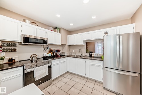 3207 139 Avenue, Edmonton, AB - Indoor Photo Showing Kitchen With Stainless Steel Kitchen With Double Sink