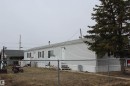 Single-story residence featuring white siding and a light-colored roof - 4839 49 Avenue, Chipman, AB  - Outdoor With Exterior 