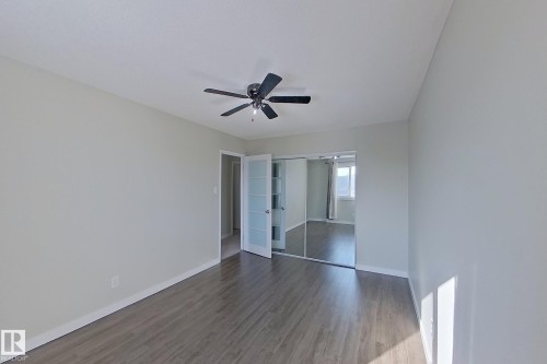 This room features light-toned walls, wood-look flooring, and a ceiling fan - 184 Cornell Court, Edmonton, AB - Indoor Photo Showing Other Room