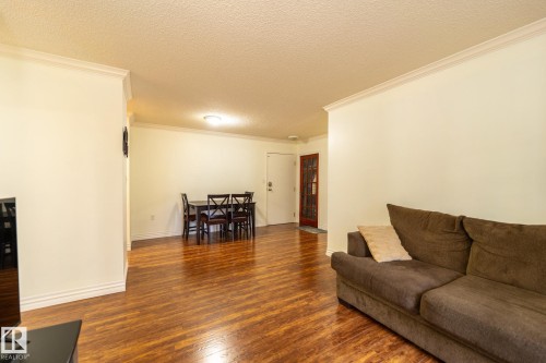 142 10636 120 Street, Edmonton, AB - Indoor Photo Showing Living Room