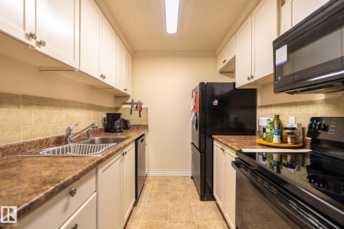142 10636 120 Street, Edmonton, AB - Indoor Photo Showing Kitchen With Double Sink