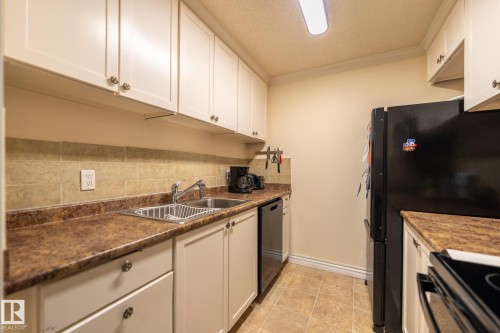 142 10636 120 Street, Edmonton, AB - Indoor Photo Showing Kitchen With Double Sink