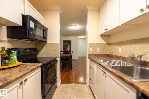 142 10636 120 Street, Edmonton, AB - Indoor Photo Showing Kitchen With Double Sink