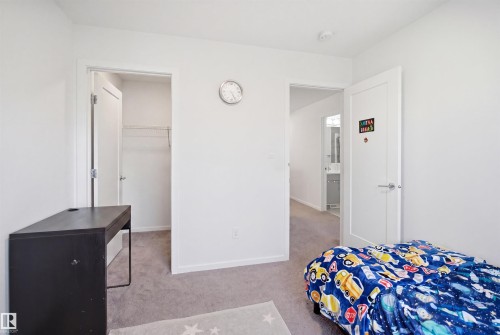 Room featuring light gray carpet, white walls, and white trim - 7782 174A Avenue, Edmonton, AB - Indoor Photo Showing Bedroom