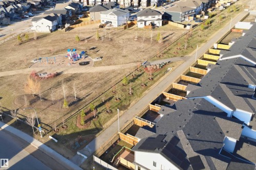 Aerial perspective showcasing residential roofs with dark shingles - 7782 174A Avenue, Edmonton, AB - Outdoor With View