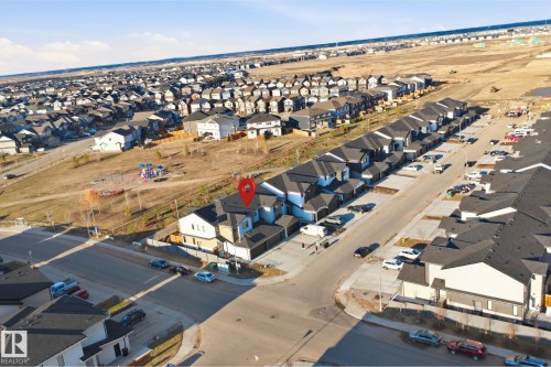 Aerial perspective highlighting a residential community with numerous detached and attached homes - 7782 174A Avenue, Edmonton, AB - Outdoor With View