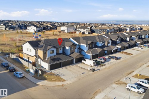 Modern residential structure featuring contemporary architectural design and multi-toned exterior siding - 7782 174A Avenue, Edmonton, AB - Outdoor With View