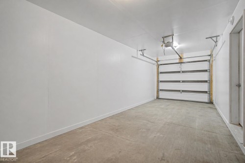 121 401 Southfork Drive, Leduc, AB - Indoor Photo Showing Garage