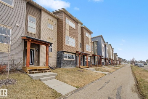 121 401 Southfork Drive, Leduc, AB - Outdoor With Facade
